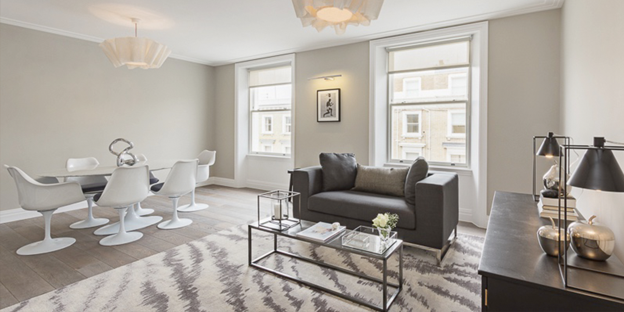 Open Plan Living Space With Tulip Chairs & Table