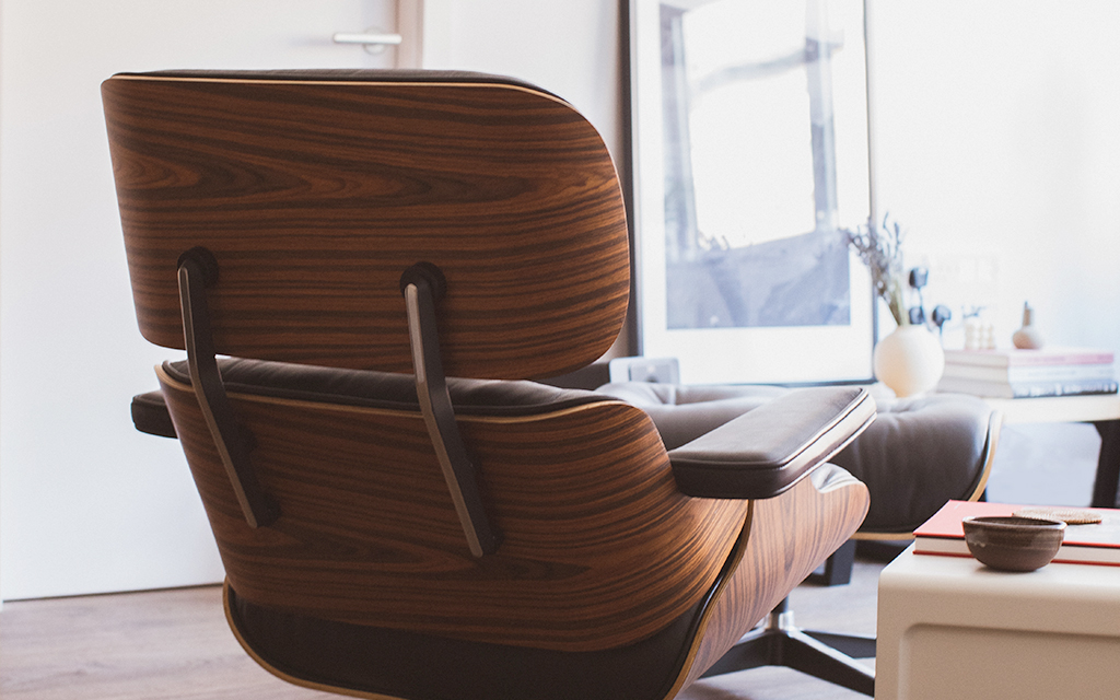 Eames Lounge Chair Replica from Pash Classics in Rosewood Veneer and black leather.