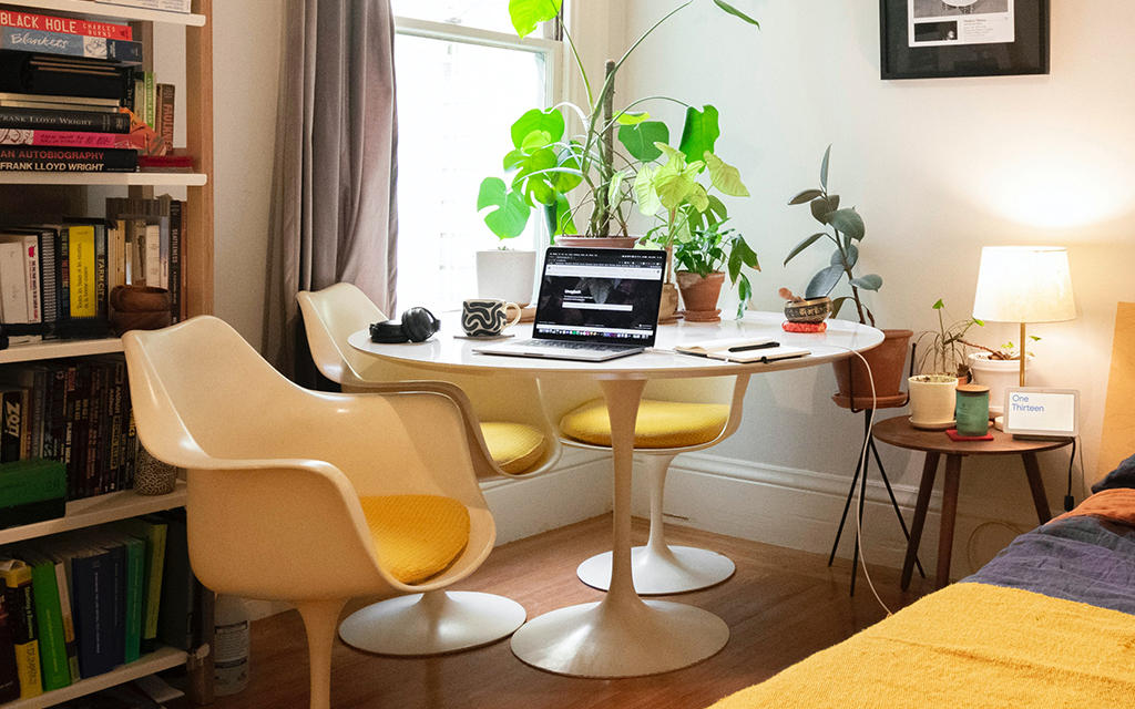 Saarinen Tulip Table and Tulip Armchair. 