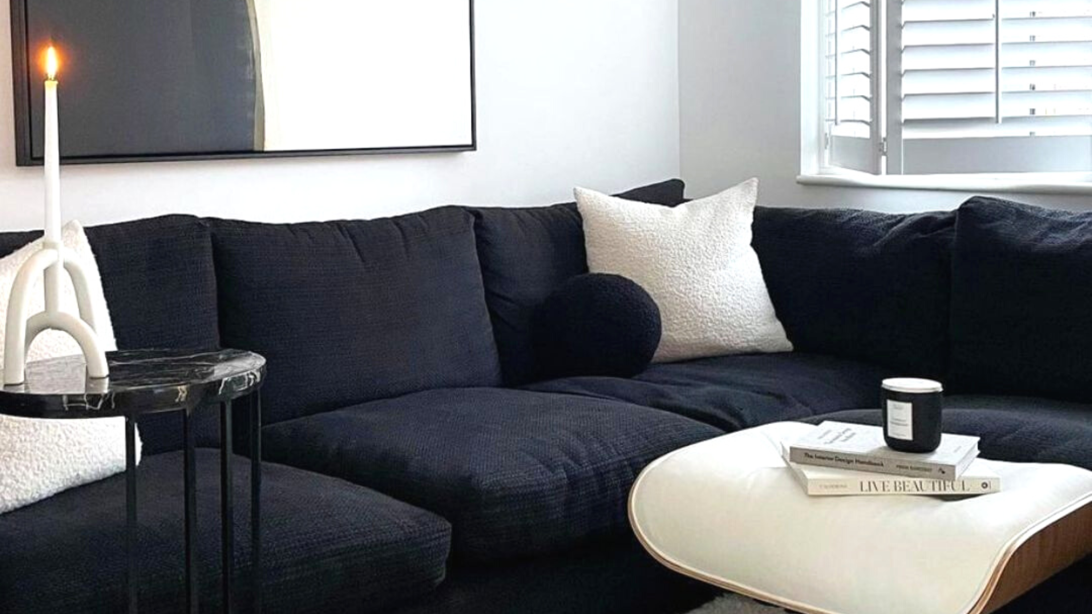 black-sofa-with-ottoman