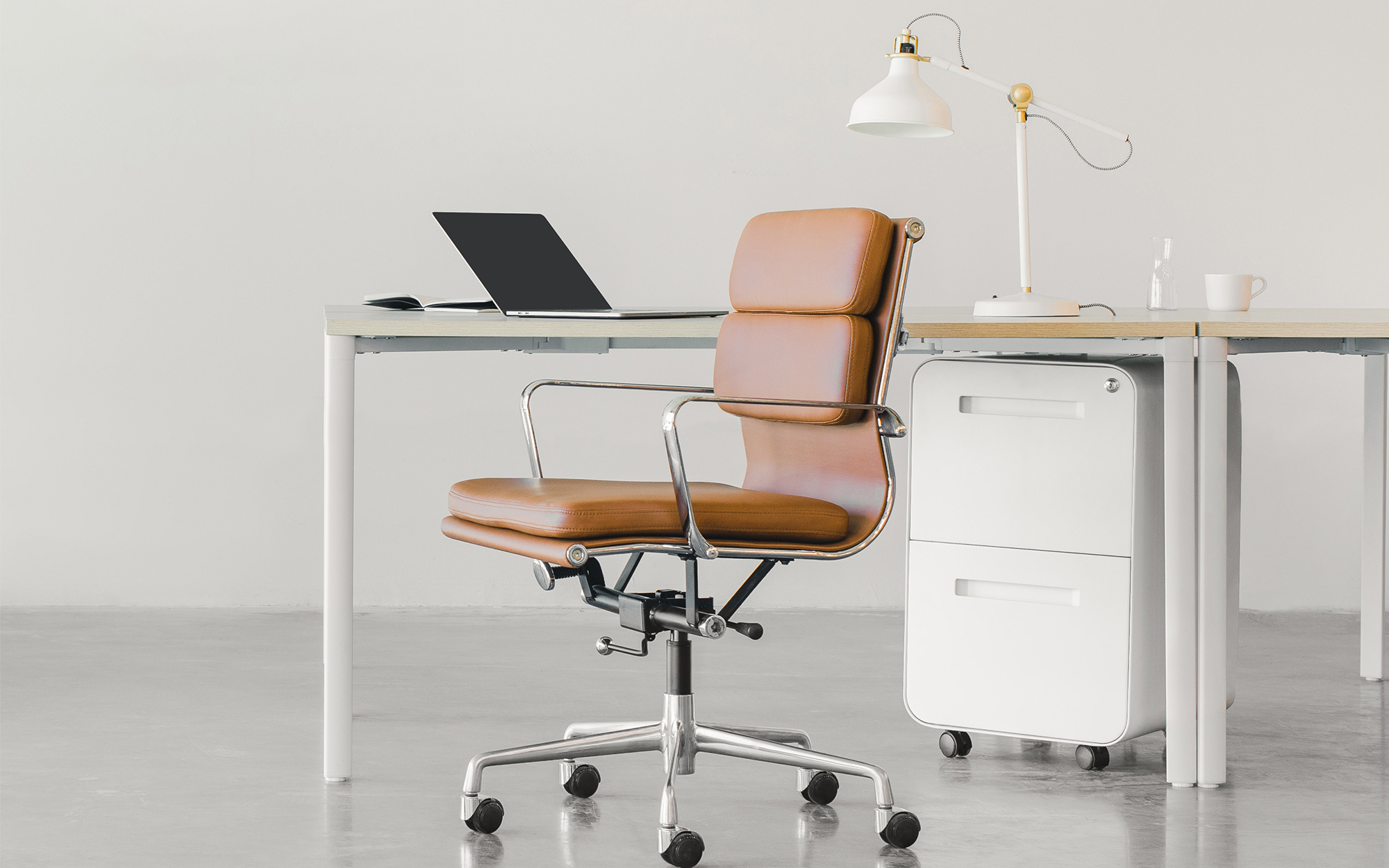 brown-leather-office-chair-at-desk