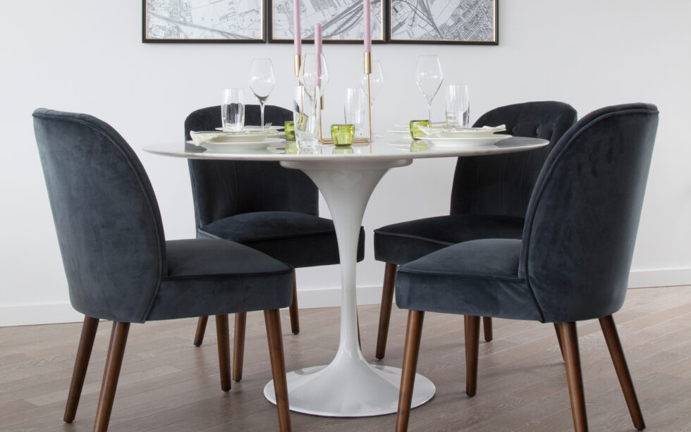white-table-with-black-chairs